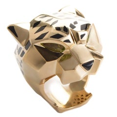 Bague Cartier Panthère en or:: péridot et onyx