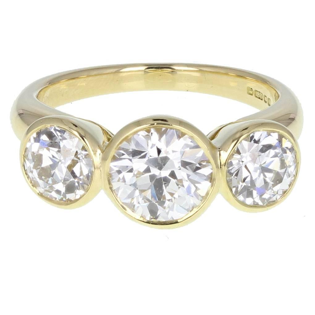 Bezel Set Diamond Three Stone 18ct Gold Ring For Sale