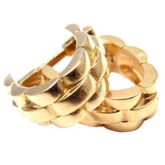 Boutons de manchette Cartier panthère maillon étrier or