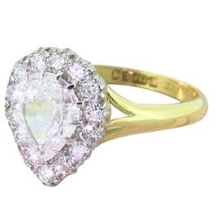 Late 20th Century 1.50 Carat Old Pear Cut Diamond Gold Cluster Ring