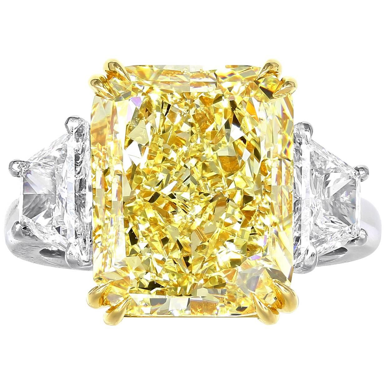 7.18 Carat Fancy Yellow GIA Certified Cushion Cut Diamond Engagement 3 Stone Rin For Sale