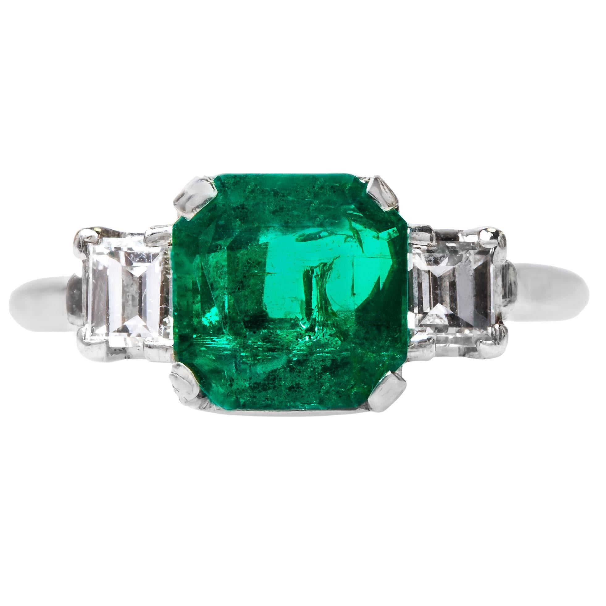 Bold Modern Era Emerald Ring with Square Step Cut Diamonds