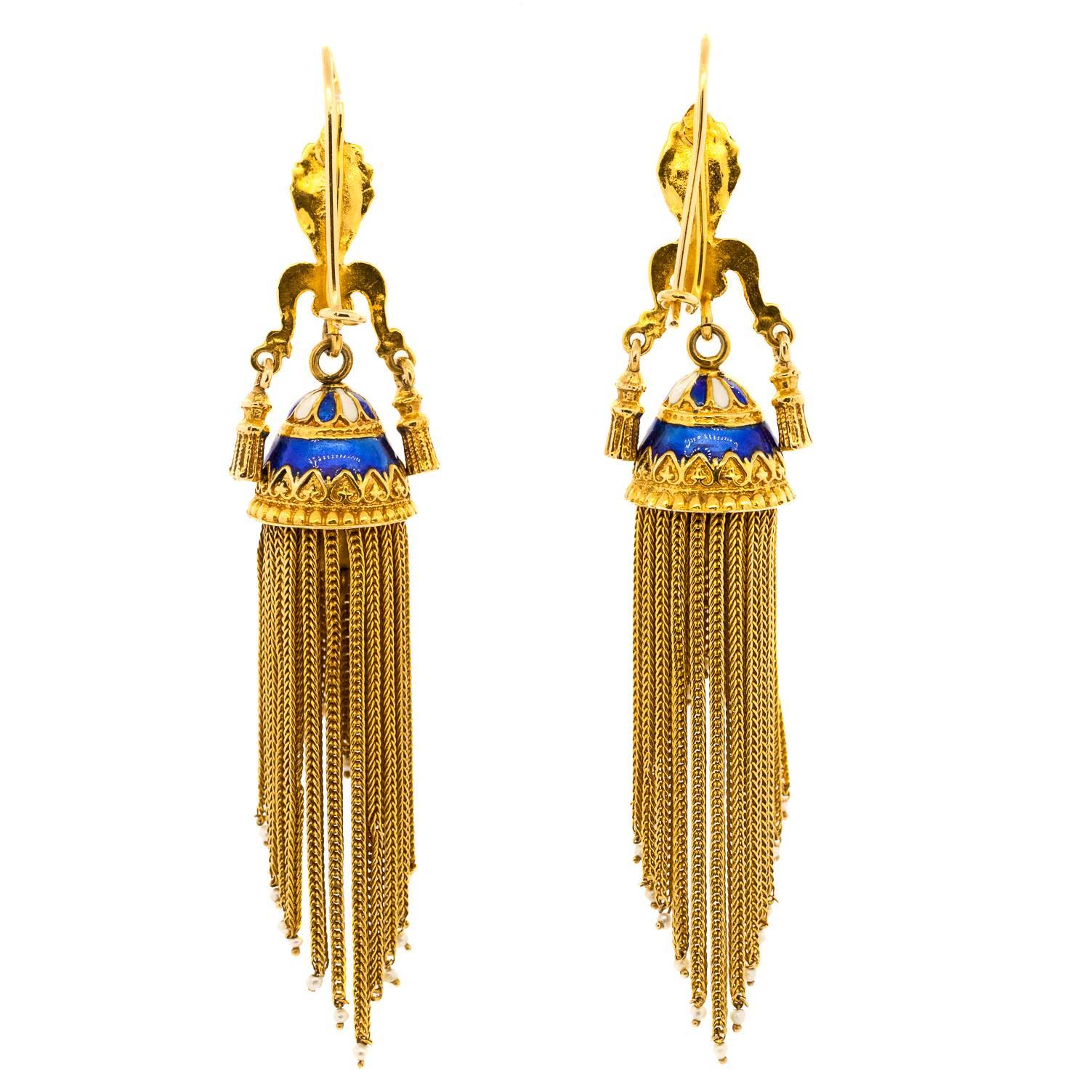 Delicately Victorian Revival earrings in 14KT yellow gold.  Graduating tassels dangle from a bell shape cup, small white Pearls accent the ends of the tassels. Blue enamel enhances the engraved bell cups.  The earrings will make you feel like a