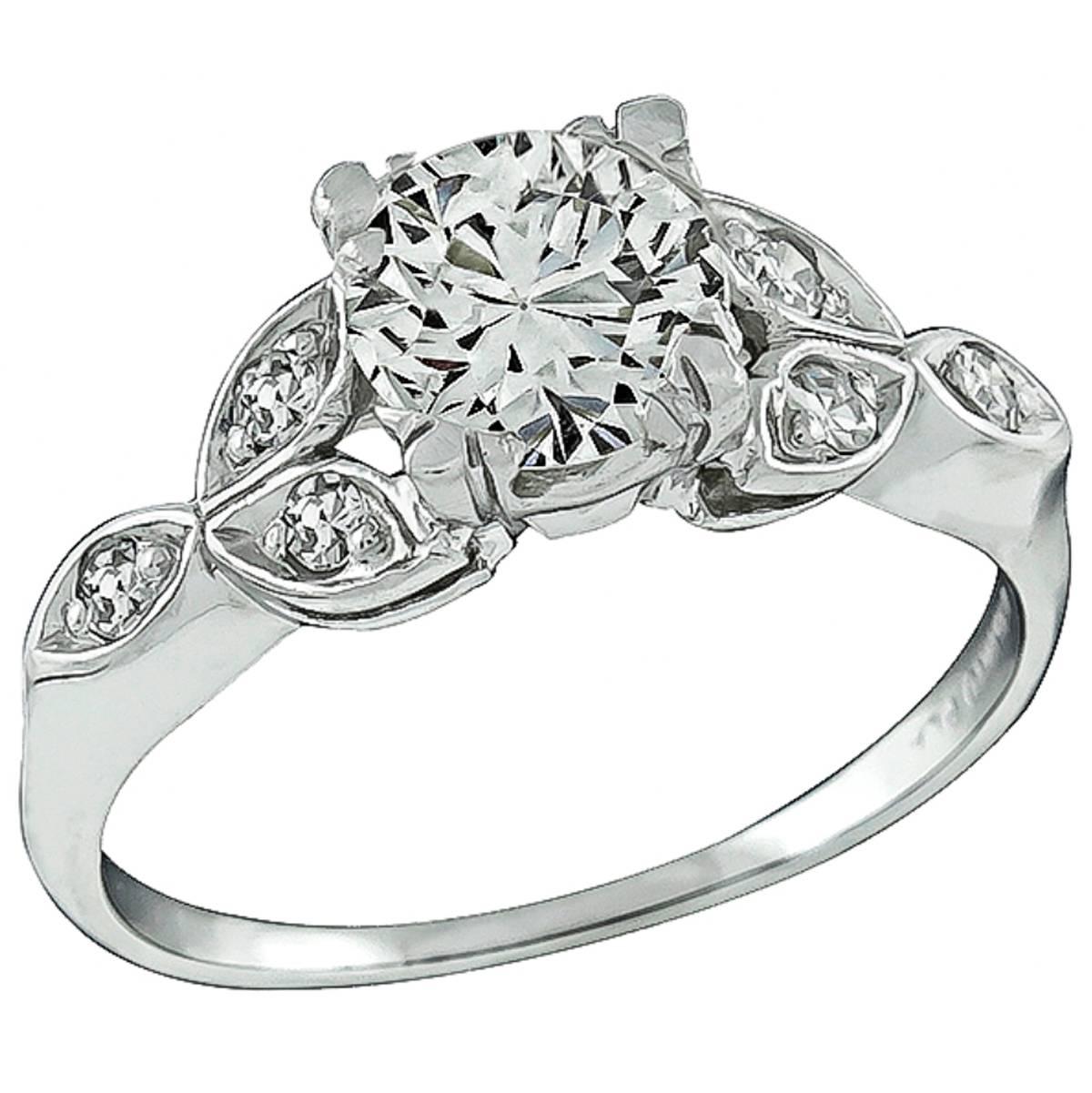 Charming 0.90 Carat Diamond Platinum Engagement Ring For Sale