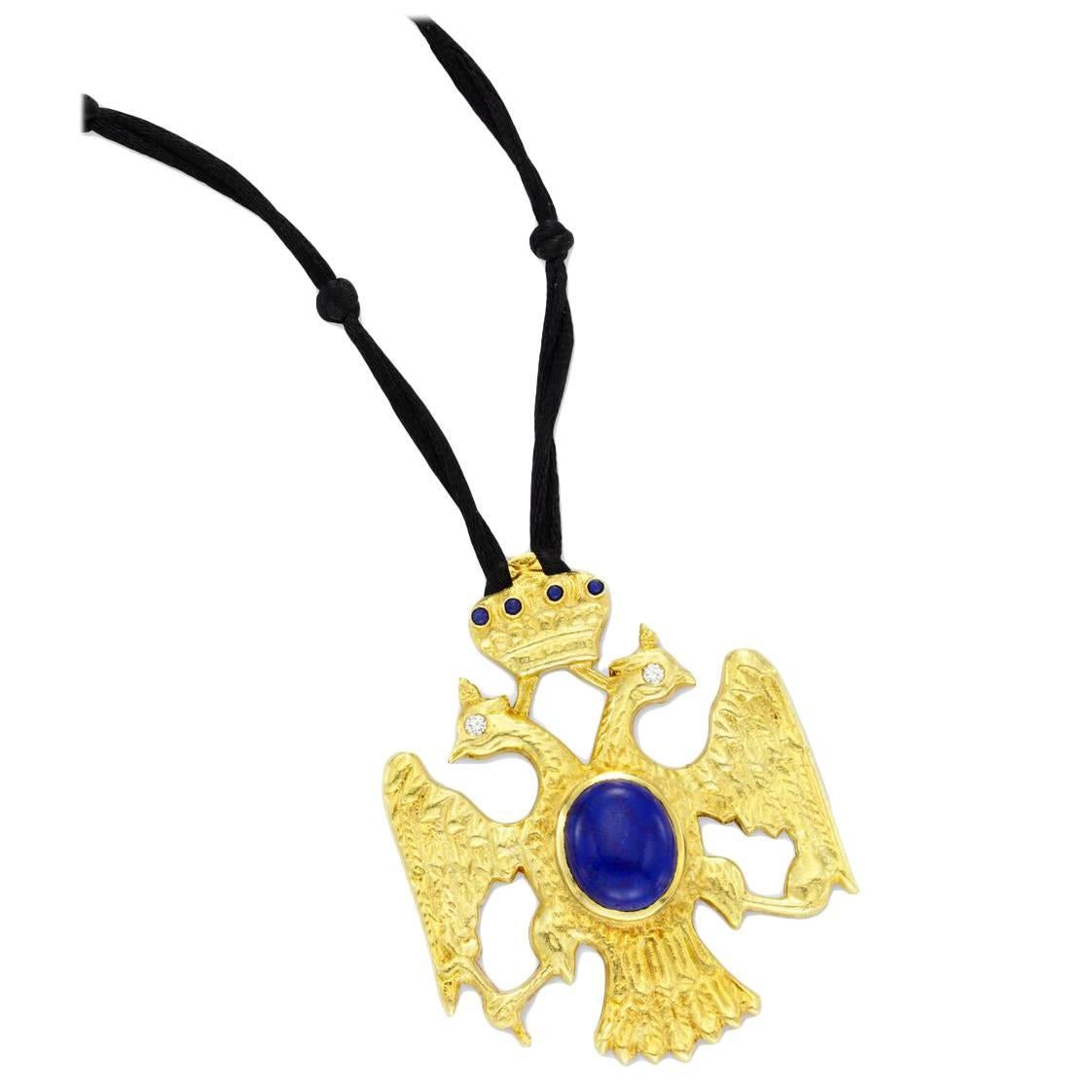 Van Cleef & Arpels, A Lapis Lazuli and Gold Eagle Pendant Necklace For Sale