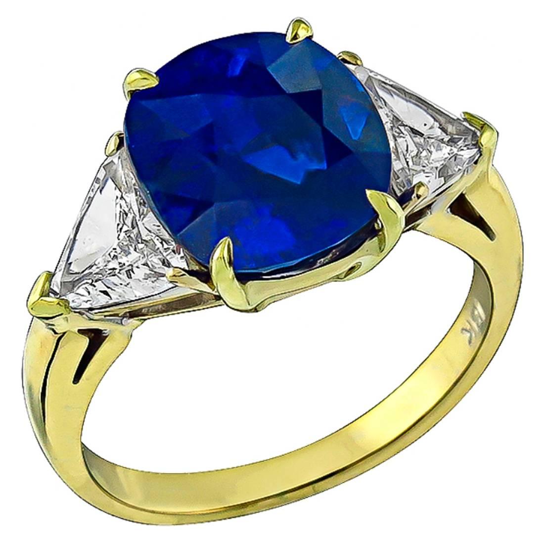 Stunning 5.28 Carat Cushion Cut Sapphire Diamond Gold Engagement Ring For Sale