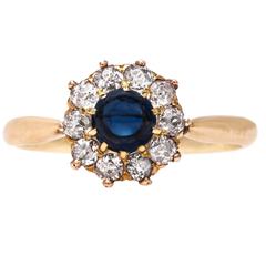 Victorian Deep Blue Cabochon Sapphire Gold Center Cluster Ring Victorian Deep Blue Cabochon Sapphire Gold Center Cluster Ring