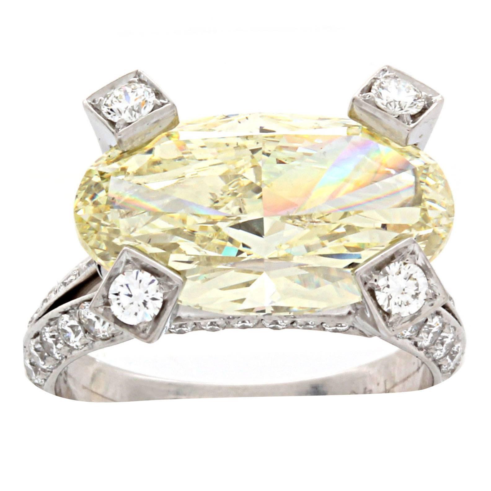 5.66 Carat GIA Certified Fancy Yellow Diamond Platinum Ring For Sale