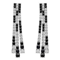 Carl F. Bucherer Black and White Diamond Gold Three Row Drop Earrings Carl F. Bucherer Black and White Diamond Gold Three Row Drop Earrings
