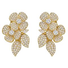 Pavé-Diamant-Ohrringe aus Gold mit doppelter Blüte