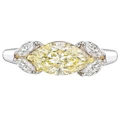 1.32 Carat GIA Cert Marquise-Shaped Pale Yellow Diamond Gold Platinum Ring