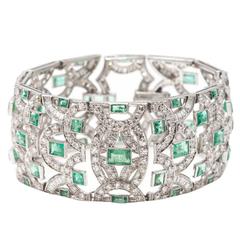 Antique 1930s Emerald Diamond Platinum Scroll Motif Bracelet