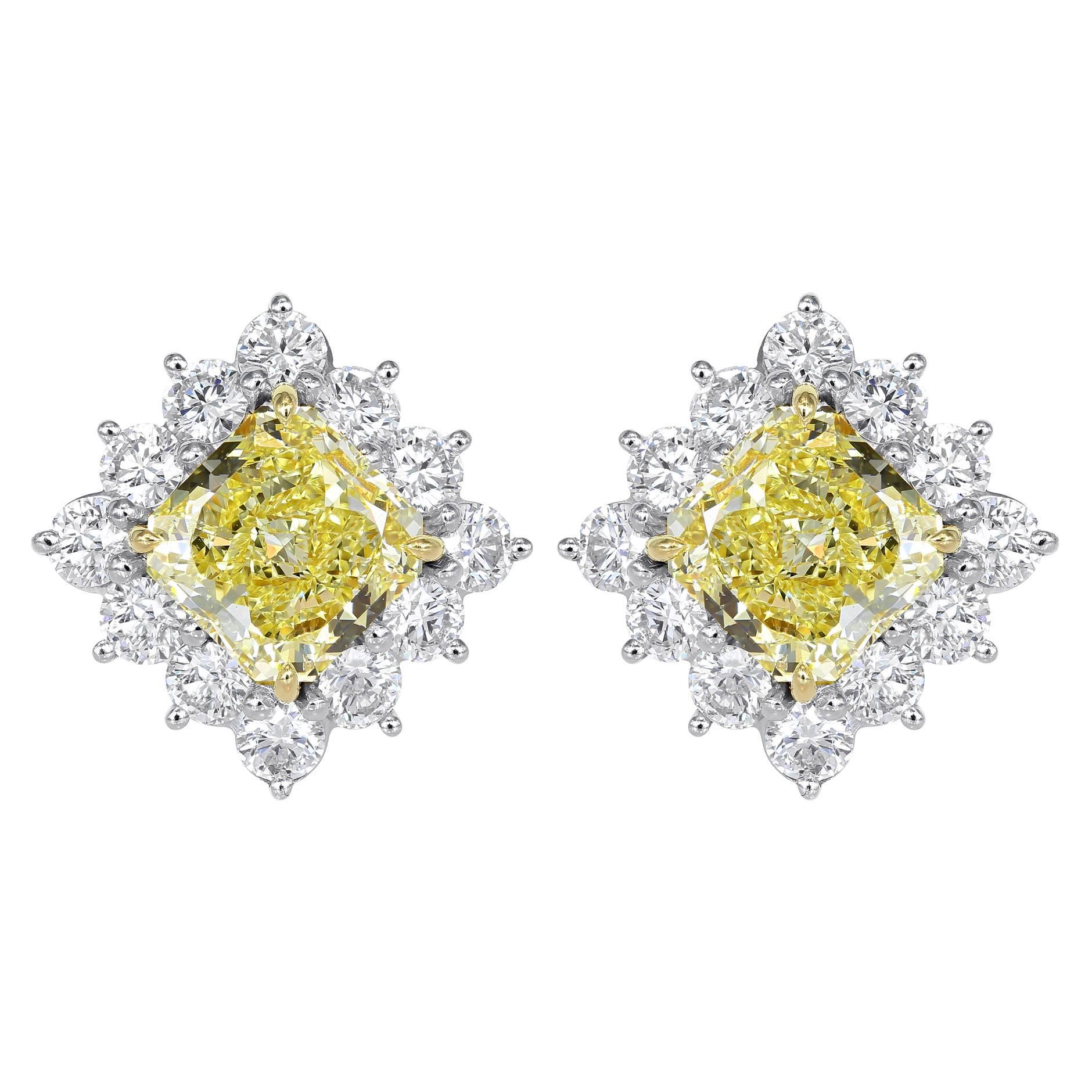 5.02 Carat GIA Certified Canary and White Diamond Stud Earrings For Sale