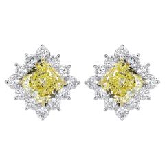5.02 Carat GIA Certified Canary and White Diamond Stud Earrings