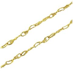 Gold Necklace with Character Motifs 9