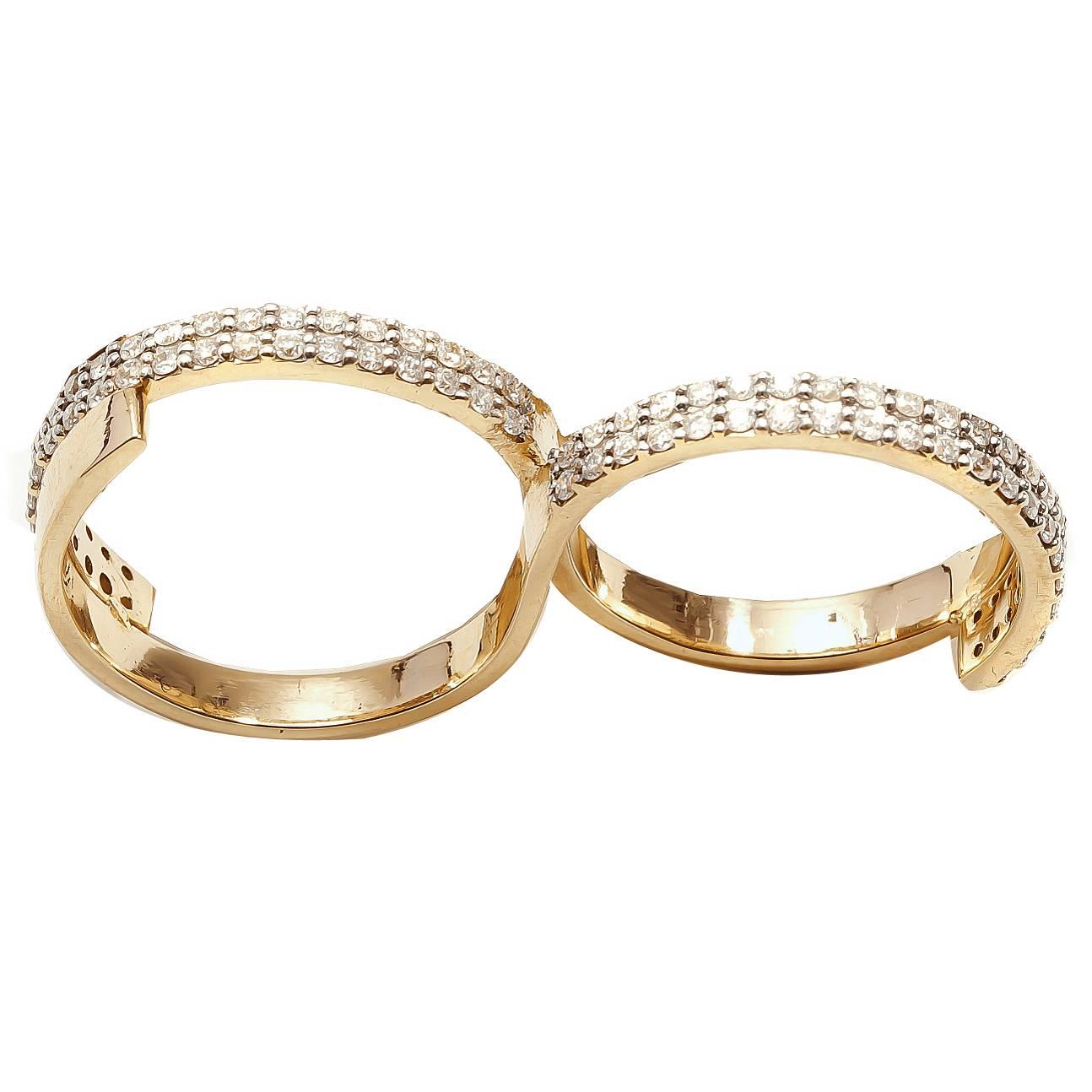 Ring aus 18 Karat Gold Fabri Unendlichkeitsring mit einlabigem Diamant im Angebot
