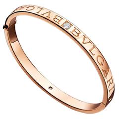 New Beautiful Signed Bulgari Diamond and 18kt Rose Pink Gold Bangle Bracelet New Beautiful Signed Bulgari Diamond and 18kt Rose Pink Gold Bangle Bracelet