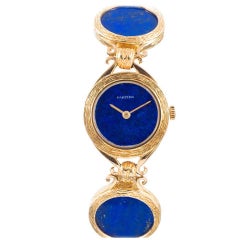 Cartier Rare Lady's Yellow Gold and Lapis Lazuli Bracelet Watch, circa 1972
