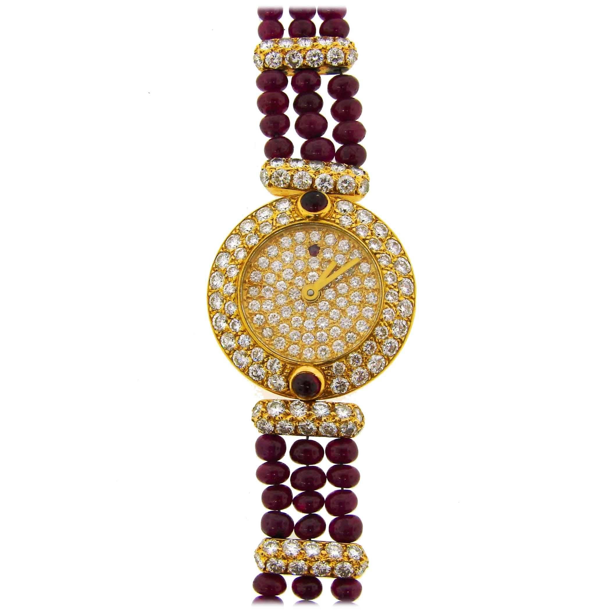 Boucheron Montre-bracelet vintage pour femme en or jaune 18 carats, diamants, rubis et quartz