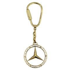 Porte-clés or diamant emblème Mercedes