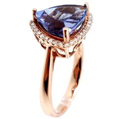 Vivid Violet Blue Trillion 6.07 Carat Tanzanite Diamond Gold Ring