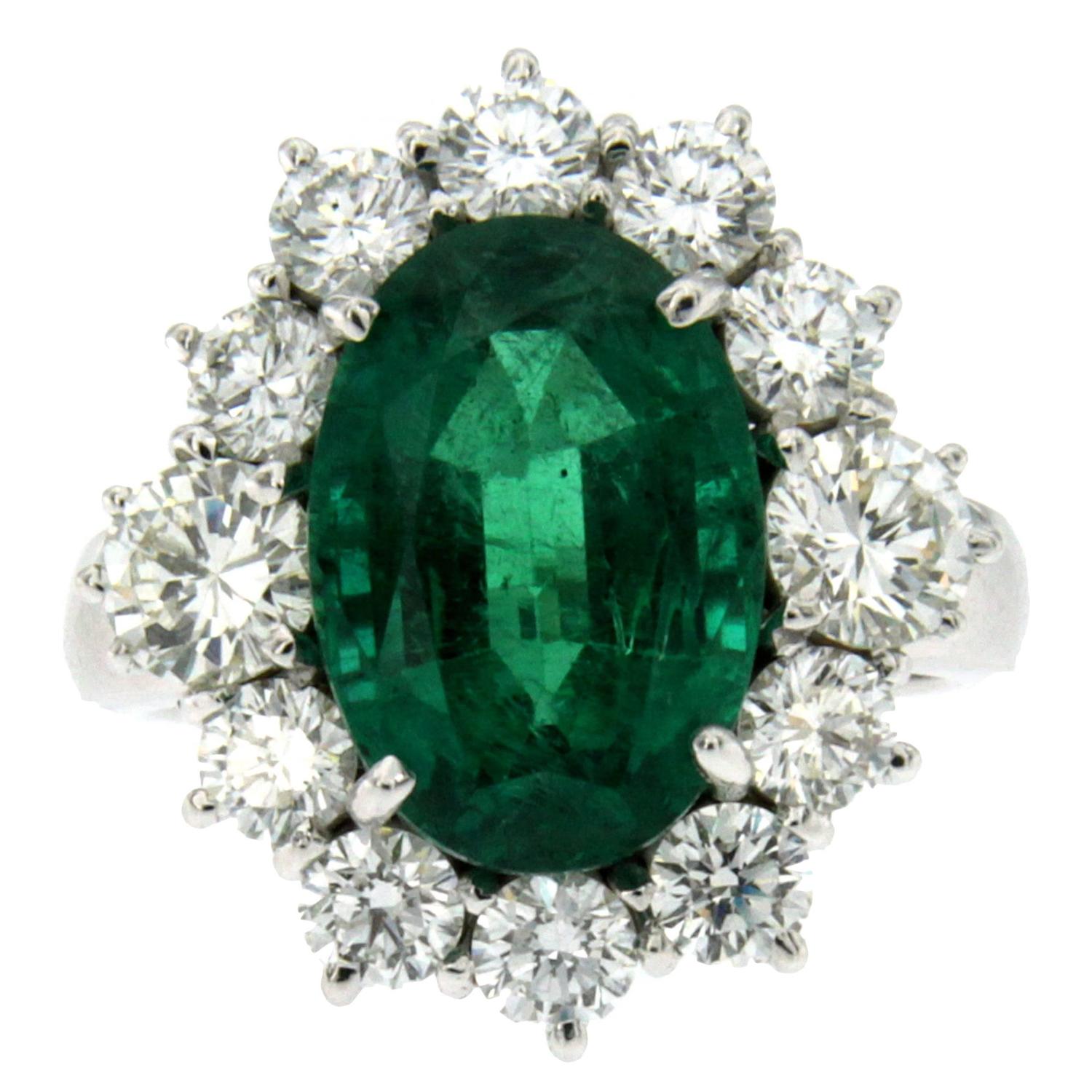 Exceptional 6.60 Carat Emerald 3.30 Carats Diamonds Cluster Ring at 1stdibs