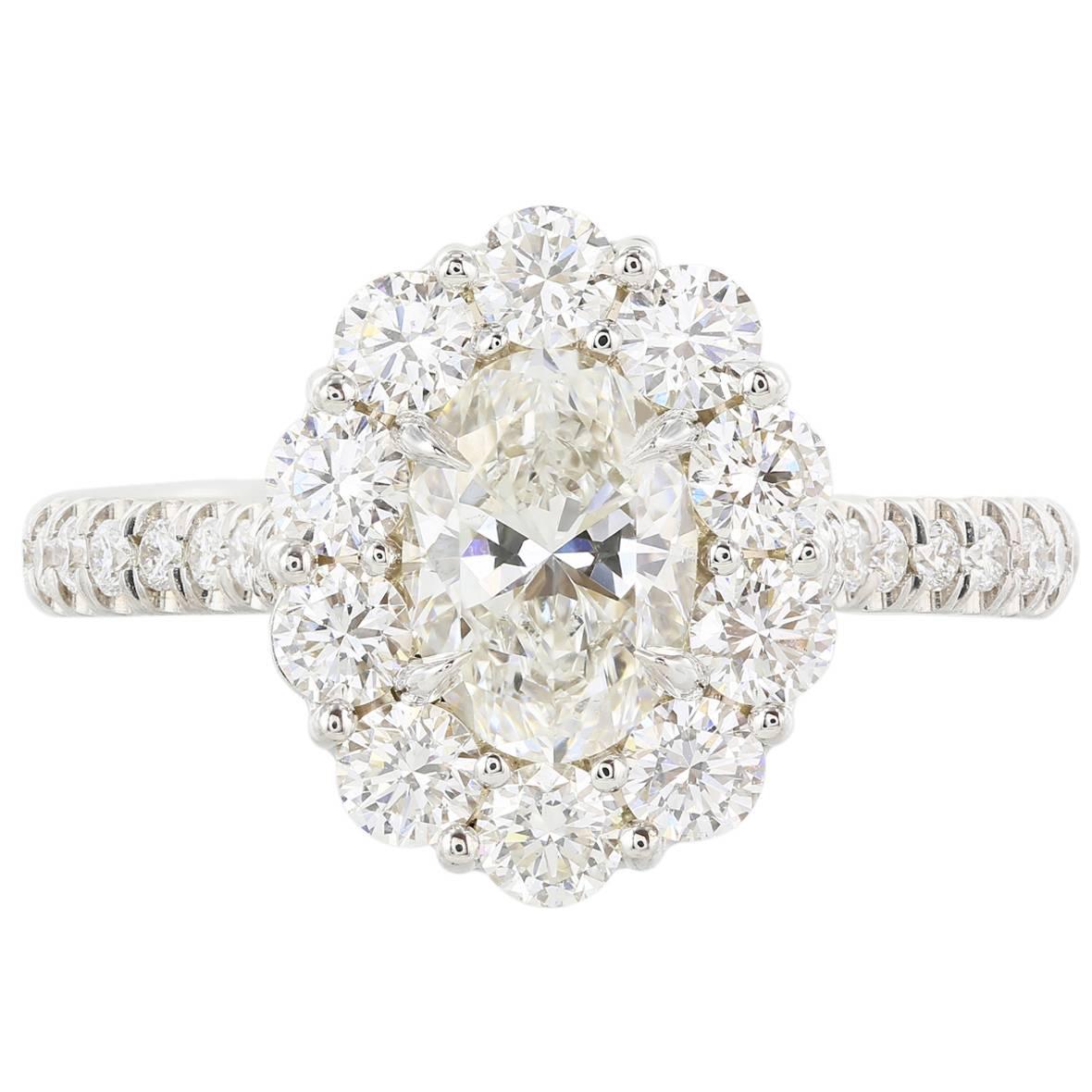.90 Carat Oval Diamond Gold Halo Ring For Sale