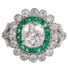 1.32 Carat Old European Cushion Diamond Ring with Emerald and Diamond Frame