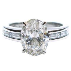 GIA Certified 3.14 CTW Oval and Baguette Diamond Platinum Engagement Ring