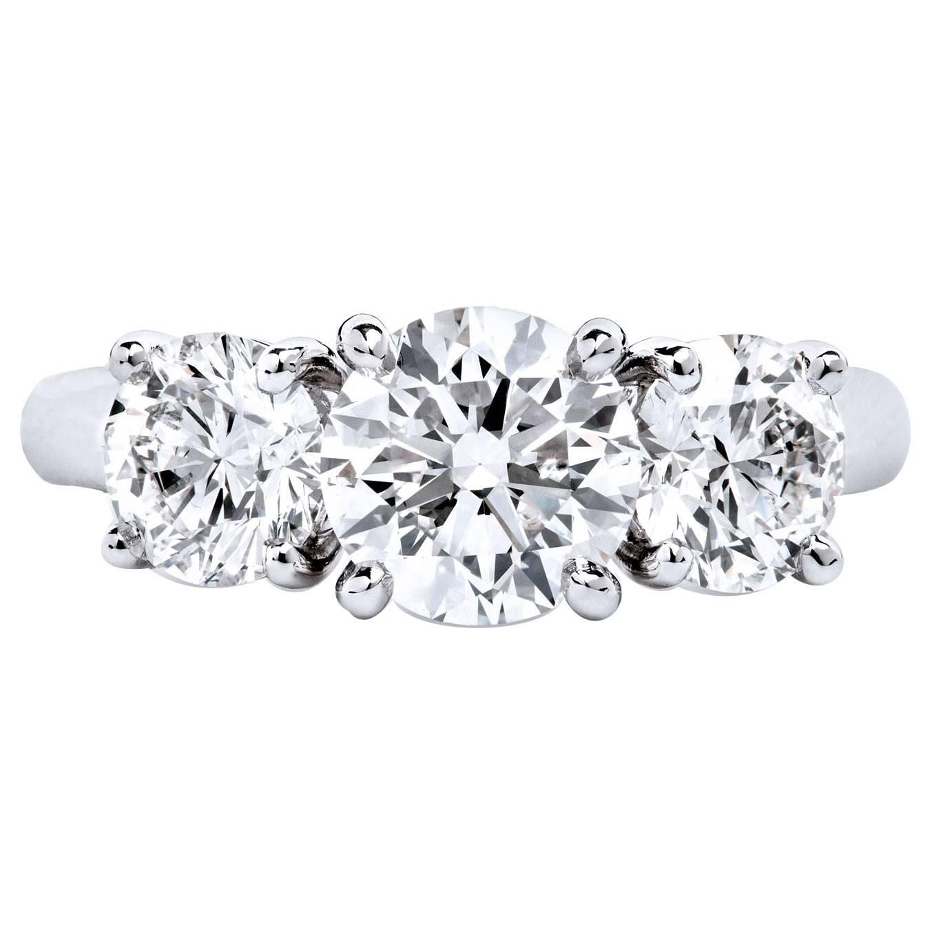 Round Brilliant Cut GIA Cert Diamonds High Polished Platinum Three Stone Ring