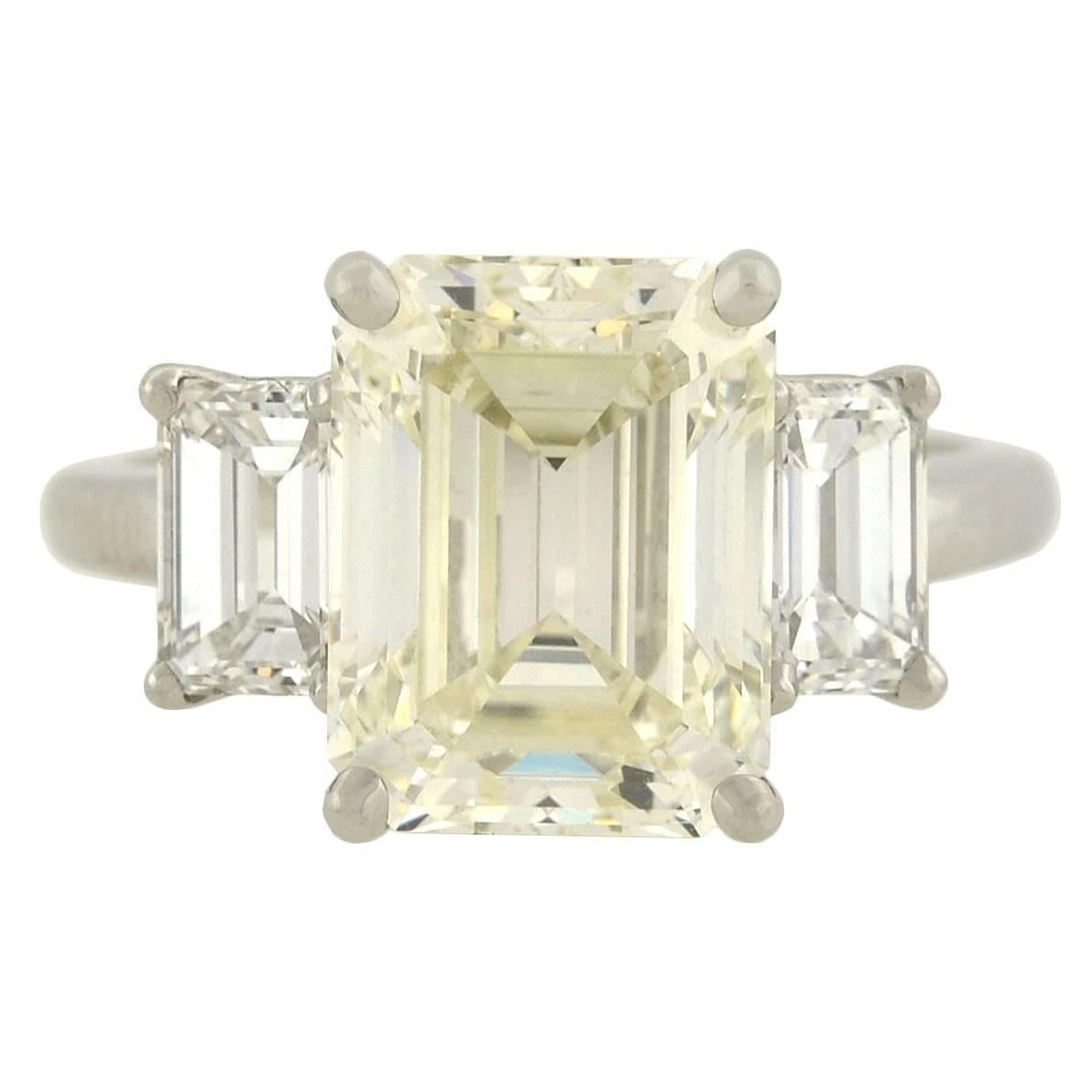 Contemporary 4.13 Carat Emerald Cut Diamond Platinum 3 Stone Engagement Ring 
