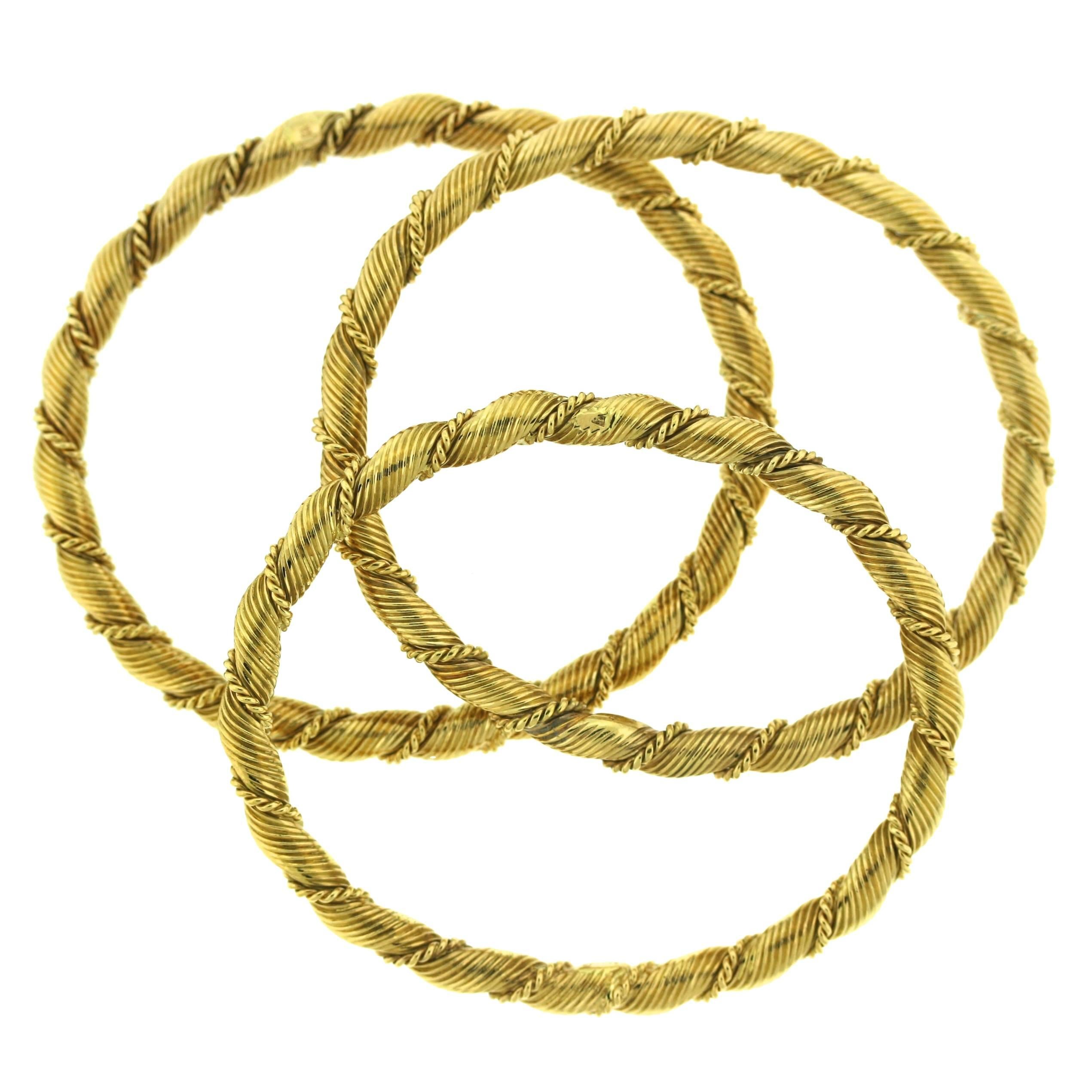 Van Cleef & Arpels Set of Three Gold Bangle Bracelets For Sale