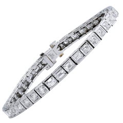 Modern 5.09 Carat Emerald and Round Brilliant Cut Diamond Platinum Bracelet