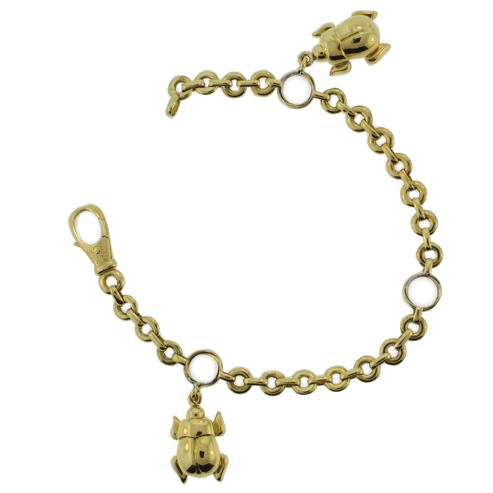 Cartier Scarab Three Color Gold Trinity Charm Bracelet For Sale