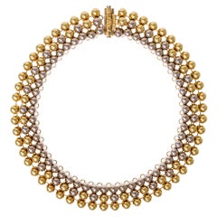 Collana Valentino anni '70 con collare di perline d'oro bicolore