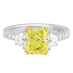 Fancy Intense Yellow Radiant and Trapezoid Diamonds Gold Platinum Ring