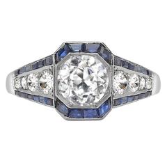 Brilliant Cut Diamond Platinum Ring with Calibré Cut Sapphire Surround 9
