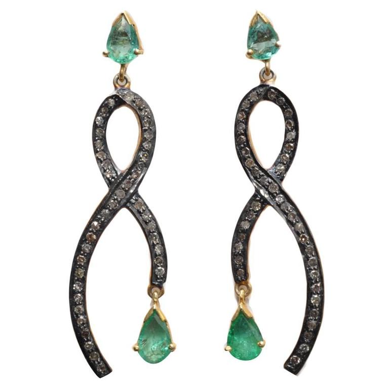 Pear-Shaped Faceted Emeralds with Pave Set Diamonds For Sale