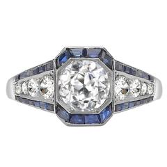 Brilliant Cut Diamond Platinum Ring with Calibre Cut Sapphire Surround 10