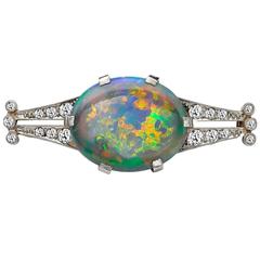 Yellow gold and silver opal and brilliant cut diamond brooch 12