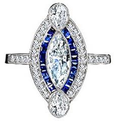 Marquise cut diamond with sapphire and diamond surround 12