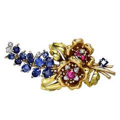 1940s diamond sapphire  ruby gold floral spray brooch