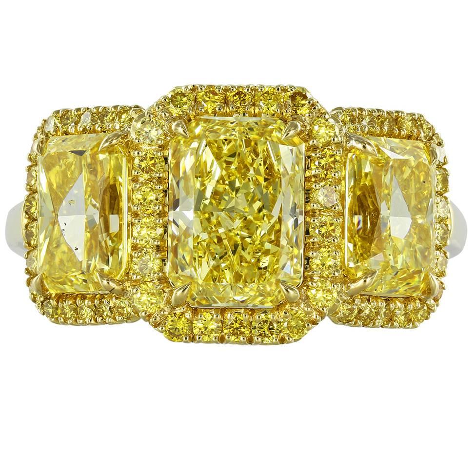 3.53 Carat Radiant Canary Stone Diamonds Gold Three-Stone Engagement Ring For Sale