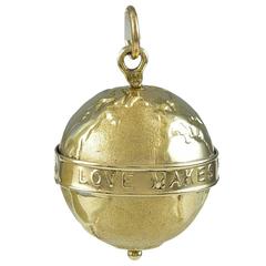 Love Makes the World Go Round Gold Globe Charm 11