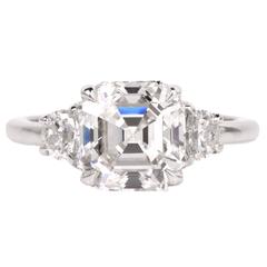Certified 3.17 Carats Asscher Diamond Three Stone Platinum Engagement Ring