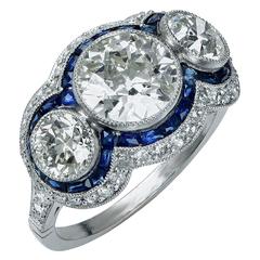 3.74 Carat Diamond Sapphire Platinum Three Stone Ring