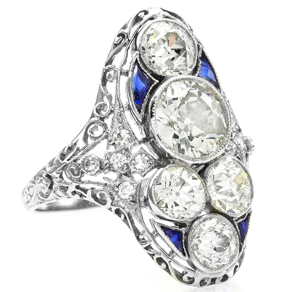 Antique Edwardian Elongated Diamond Ring with Sapphire Accents in Platinum For Sale