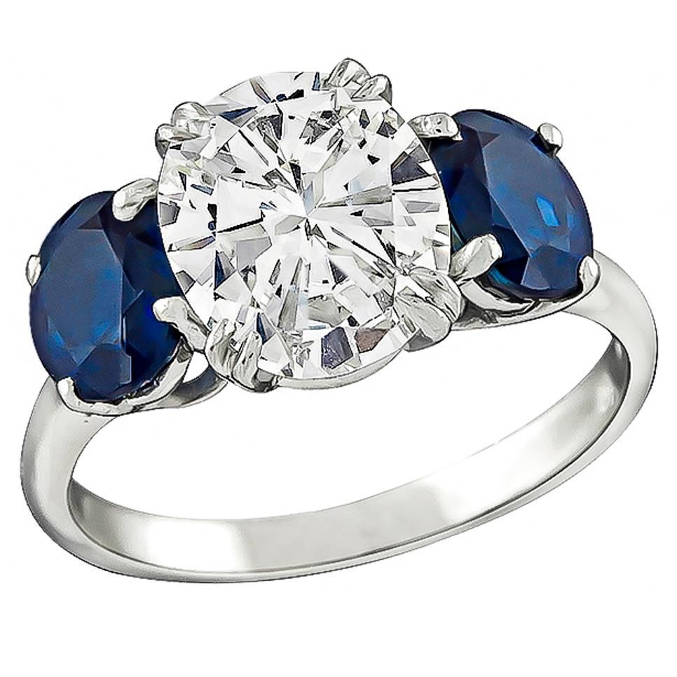 2.12 Carat Oval Cut Diamond Sapphire Platinum Engagement Ring