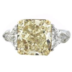 5.44 Carat GIA Radiant Fancy Light Yellow Diamond Gold Platinum 3 Stone Ring
