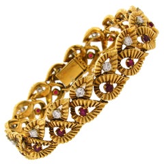 1950s Boucheron Ruby Diamond Gold Leaf Motif Bracelet